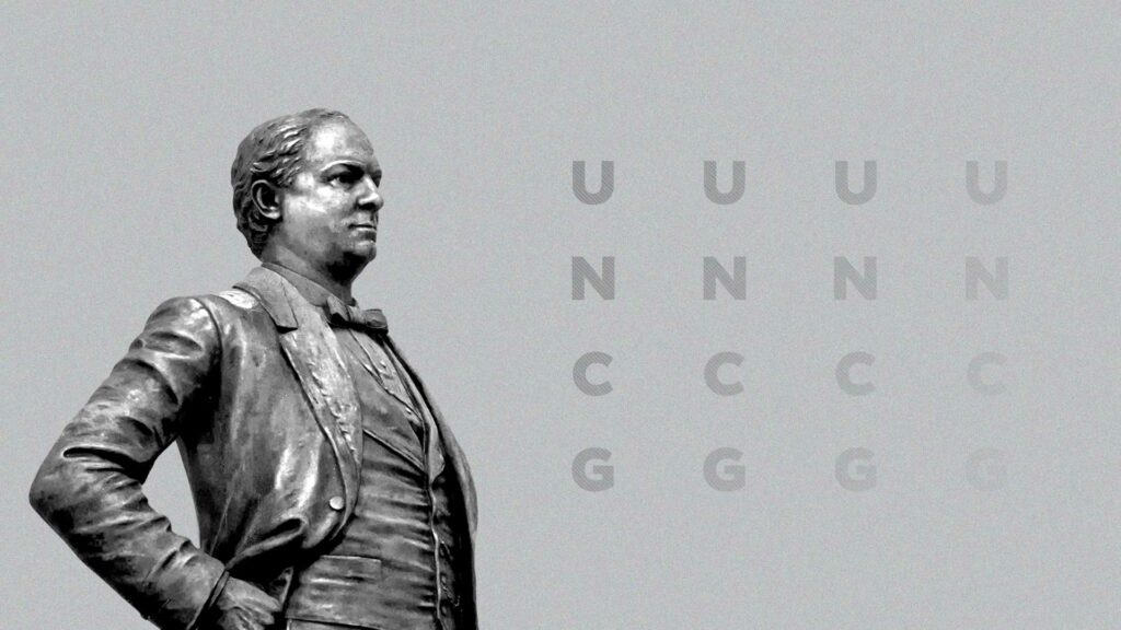 Wallpaper image of McIver Statue on gray background with UNCG letters